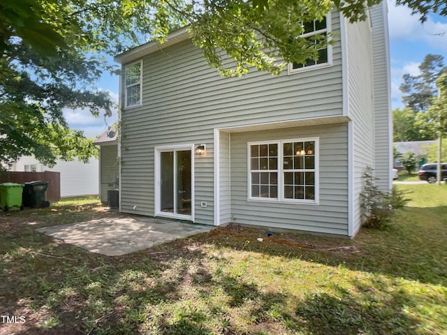 back of property with a patio and cooling unit