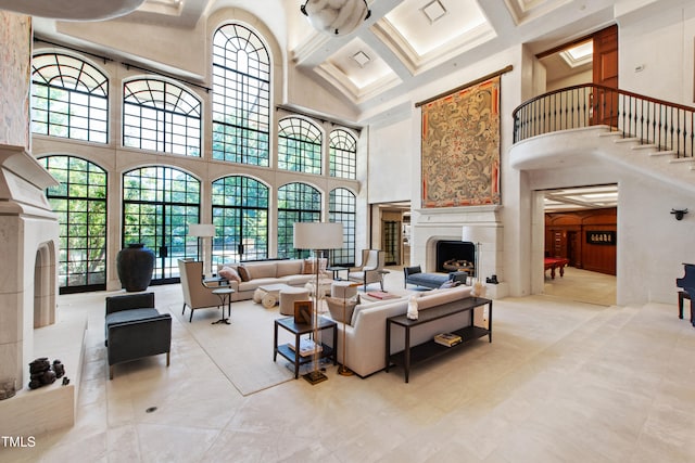 6510 New Market Way, Raleigh, NC 27615 - living room featuring a high ceiling, a fireplace, plenty of natural light, coffered ceiling, and beam ceiling