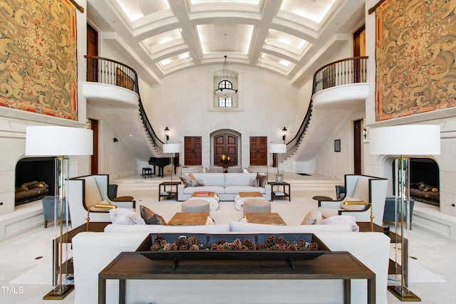 6510 New Market Way, Raleigh, NC 27615 - living area with a fireplace with raised hearth, high vaulted ceiling, stairs, and coffered ceiling
