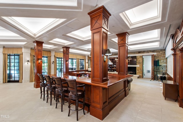 6510 New Market Way, Raleigh, NC 27615 - indoor dry bar featuring decorative columns, light tile patterned floors, coffered ceiling, and ornamental molding
