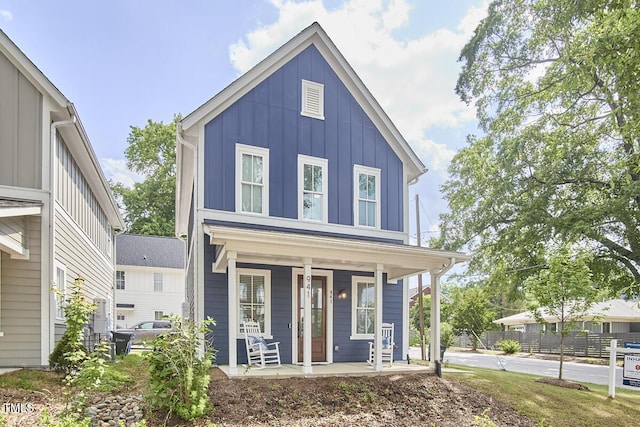 941 W Club Blvd, Durham, NC 27701 - view of front of home featuring board and batten siding and covered porch