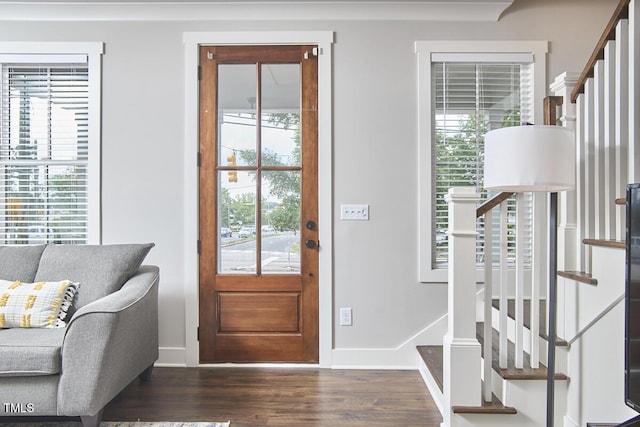 941 W Club Blvd, Durham, NC 27701 - foyer entrance with wood finished floors, baseboards, and stairs