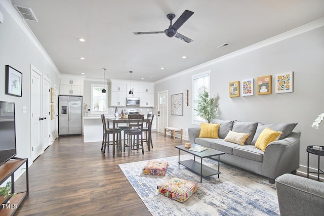 941 W Club Blvd, Durham, NC 27701 - living room with crown molding, a ceiling fan, recessed lighting, dark wood finished floors, and baseboards