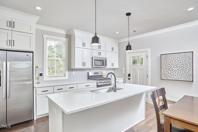 941 W Club Blvd, Durham, NC 27701 - kitchen featuring stainless steel appliances, dark wood-style flooring, white cabinets, plenty of natural light, and recessed lighting