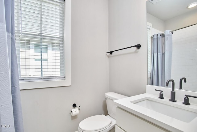 941 W Club Blvd, Durham, NC 27701 - bathroom featuring toilet, vanity, and a shower with shower curtain