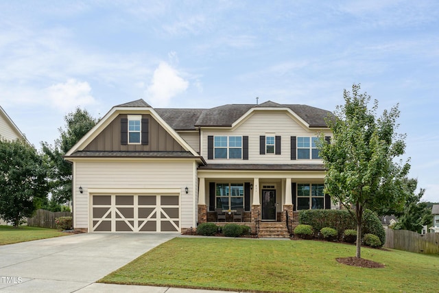 453 Granite Saddle Dr, Rolesville, NC 27571 - craftsman inspired home with board and batten siding, concrete driveway, covered porch, stone siding, and roof with shingles