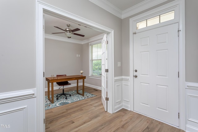 453 Granite Saddle Dr, Rolesville, NC 27571 - entrance foyer with light wood finished floors, crown molding, and ceiling fan