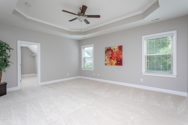453 Granite Saddle Dr, Rolesville, NC 27571 - spare room with a raised ceiling, crown molding, light carpet, ceiling fan, and a smoke detector