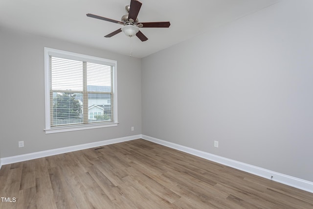 453 Granite Saddle Dr, Rolesville, NC 27571 - spare room featuring wood finished floors, baseboards, and a ceiling fan