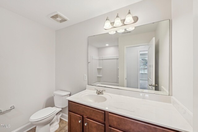 1534 Glenwater Dr, Cary, NC 27519 - bathroom with vanity, toilet, and baseboards