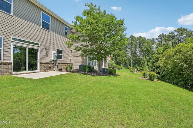 1534 Glenwater Dr, Cary, NC 27519 - view of grassy yard featuring a patio and central air condition unit