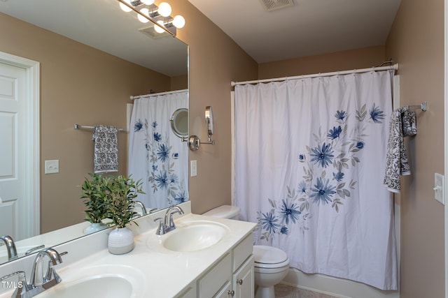 7244 Galon Glen Rd, Raleigh, NC 27613 - full bathroom featuring toilet and double vanity