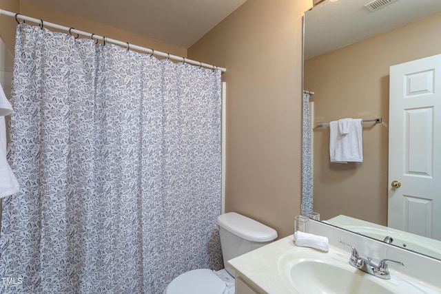 7244 Galon Glen Rd, Raleigh, NC 27613 - full bath with toilet, vanity, and a shower with shower curtain