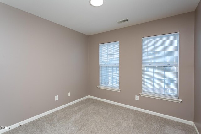 7244 Galon Glen Rd, Raleigh, NC 27613 - carpeted empty room featuring baseboards