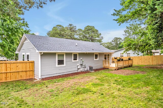 2200 Wyman Pl, Durham, NC 27707 - back of house featuring a wooden deck, roof with shingles, and central air condition unit