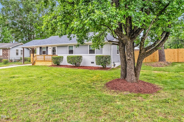 2200 Wyman Pl, Durham, NC 27707 - single story home featuring brick siding, crawl space, roof with shingles, and covered porch