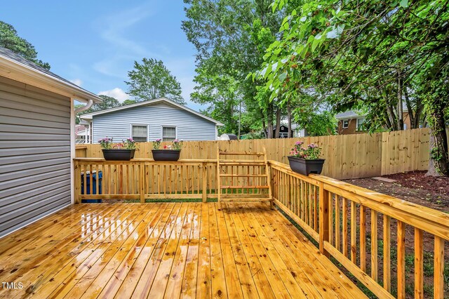 2200 Wyman Pl, Durham, NC 27707 - wooden deck with a fenced backyard