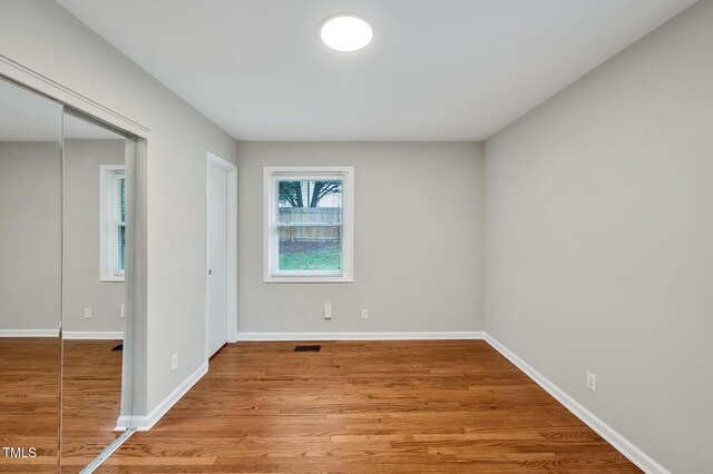 2200 Wyman Pl, Durham, NC 27707 - spare room with light wood-style flooring and baseboards