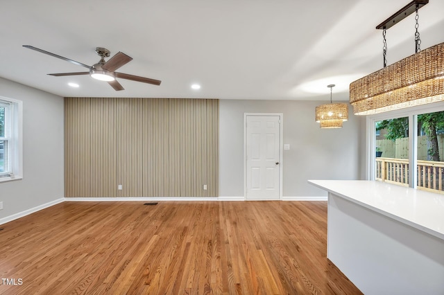 2200 Wyman Pl, Durham, NC 27707 - unfurnished room with light wood-style floors, recessed lighting, a chandelier, baseboards, and ceiling fan