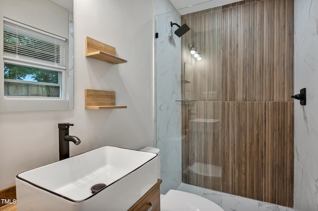 2200 Wyman Pl, Durham, NC 27707 - full bath with a marble finish shower, toilet, and vanity