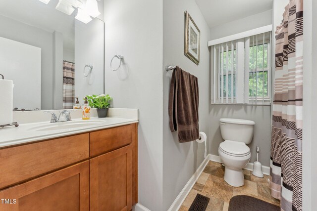 5932 Johnson Pond Rd, Fuquay Varina, NC 27526 - bathroom featuring vanity and stone finish flooring