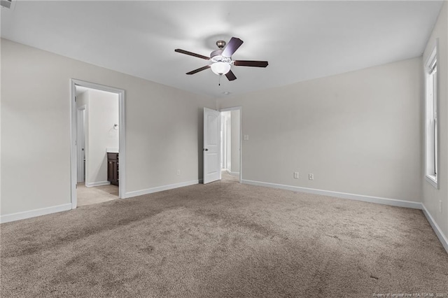 4572 Headwind Dr, Fayetteville, NC 28306 - unfurnished room with ceiling fan, light carpet, and baseboards