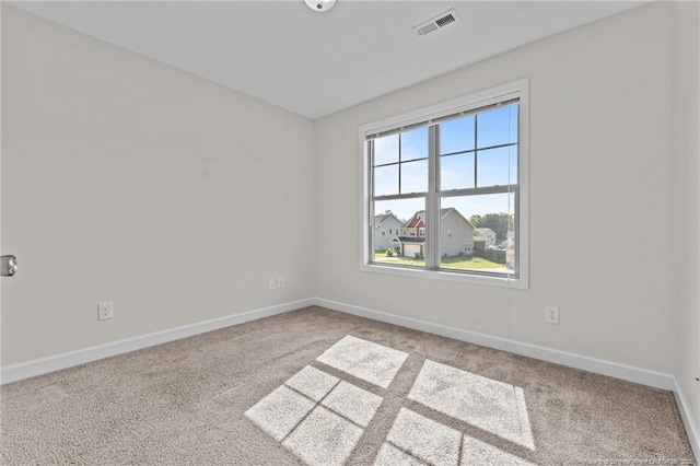 4572 Headwind Dr, Fayetteville, NC 28306 - spare room with carpet flooring and baseboards