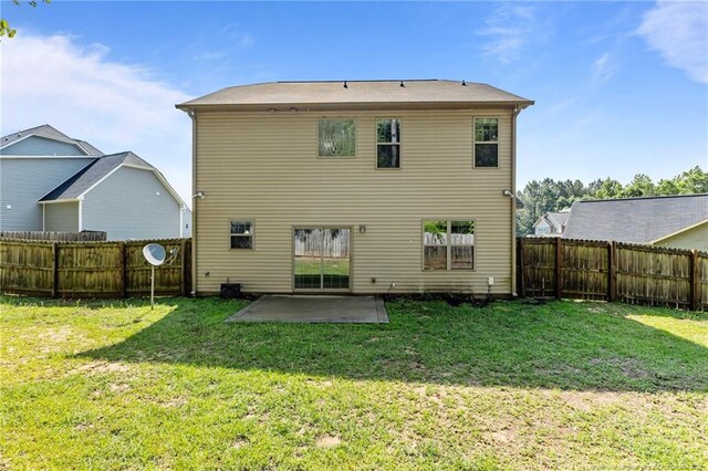 4572 Headwind Dr, Fayetteville, NC 28306 - back of house with a patio