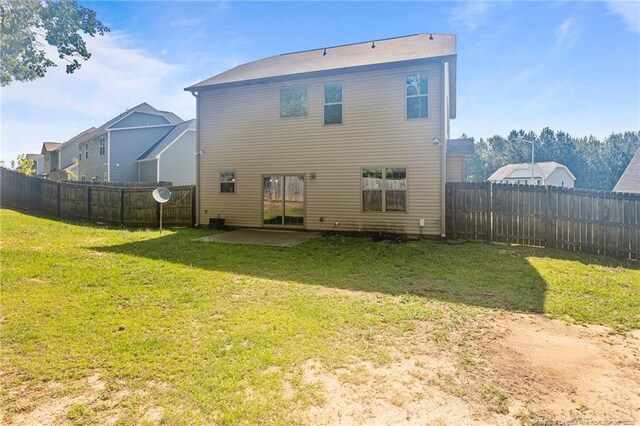 4572 Headwind Dr, Fayetteville, NC 28306 - back of property featuring a patio area