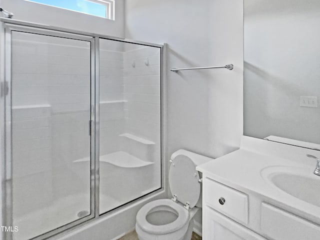8891 Commons Townes Dr, Raleigh, NC 27616 - full bathroom featuring an enclosed shower, toilet, and vanity
