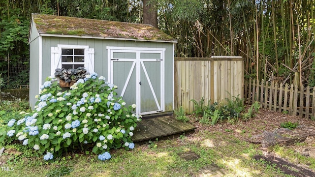 925 S Chestnut St, Henderson, NC 27536 - view of shed featuring fence