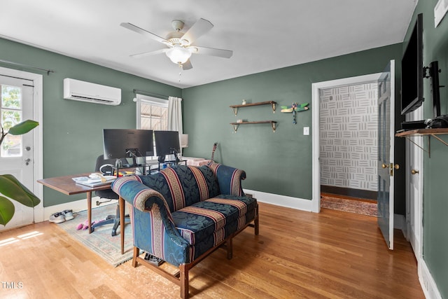 925 S Chestnut St, Henderson, NC 27536 - office space featuring a wall unit AC, wood finished floors, a ceiling fan, and baseboards
