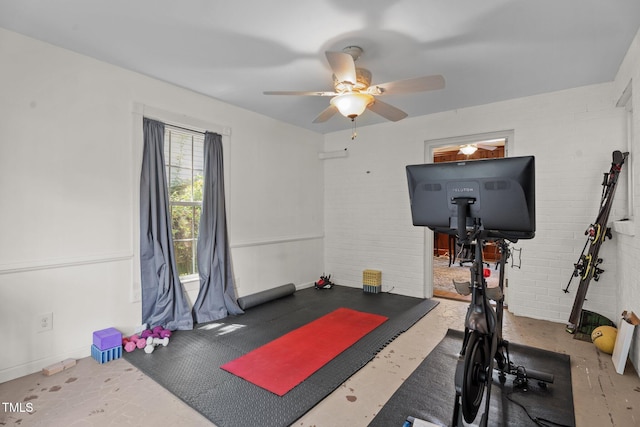 925 S Chestnut St, Henderson, NC 27536 - exercise room with ceiling fan, brick wall, and baseboards