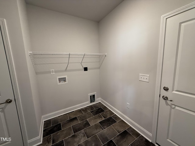 laundry area featuring baseboards and washer hookup