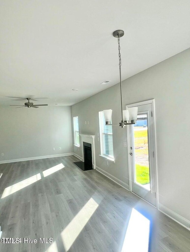 5134 Holly Hill Ct Lot 28, Battleboro, NC 27809 - unfurnished living room with wood finished floors, baseboards, and a ceiling fan