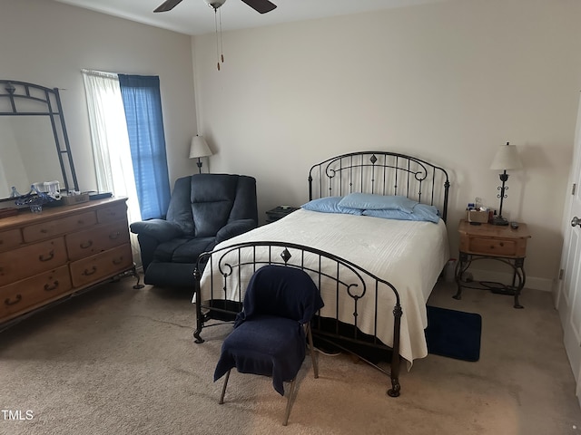 bedroom featuring carpet flooring and a ceiling fan