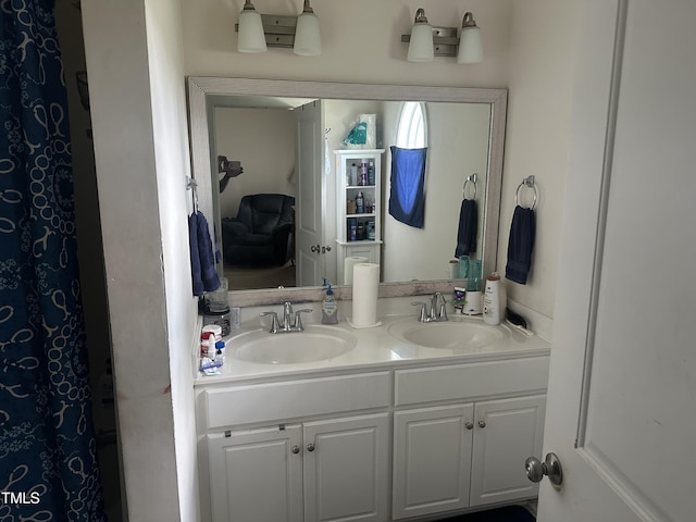 bathroom featuring double vanity