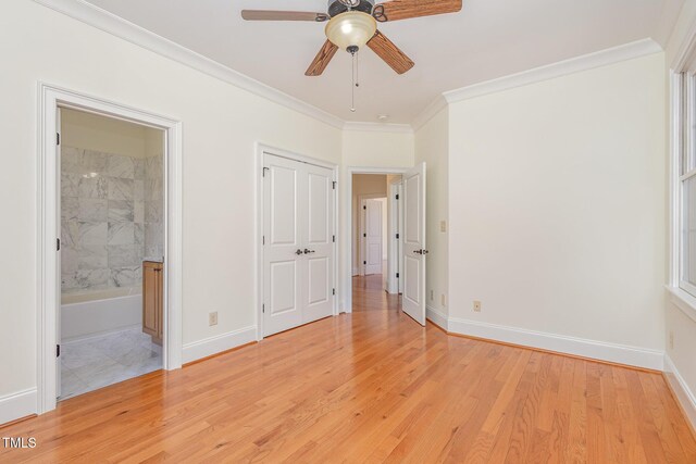 15 Treviso Pl, Durham, NC 27707 - unfurnished bedroom featuring crown molding, light wood finished floors, baseboards, and connected bathroom