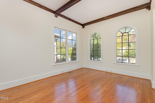 15 Treviso Pl, Durham, NC 27707 - unfurnished room with beamed ceiling, wood finished floors, and baseboards