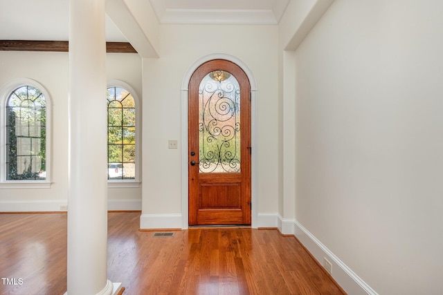 15 Treviso Pl, Durham, NC 27707 - foyer featuring wood finished floors, baseboards, and arched walkways