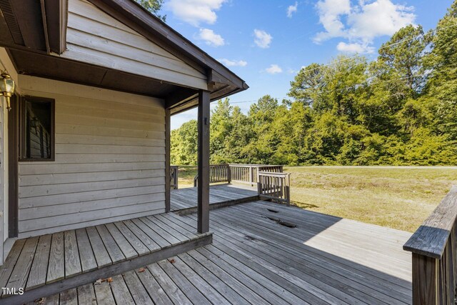5900 Ebenezer Church Rd, Raleigh, NC 27612 - wooden deck featuring a yard