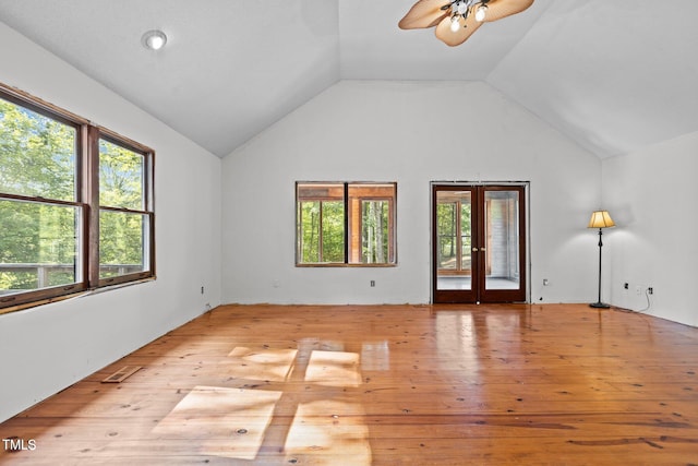 5900 Ebenezer Church Rd, Raleigh, NC 27612 - unfurnished room featuring a ceiling fan, light wood finished floors, and vaulted ceiling