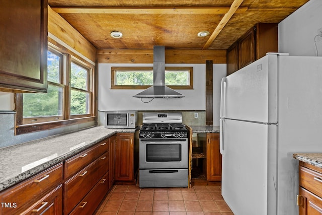 5900 Ebenezer Church Rd, Raleigh, NC 27612 - kitchen with appliances with stainless steel finishes, range hood, wood ceiling, light tile patterned floors, and light stone counters