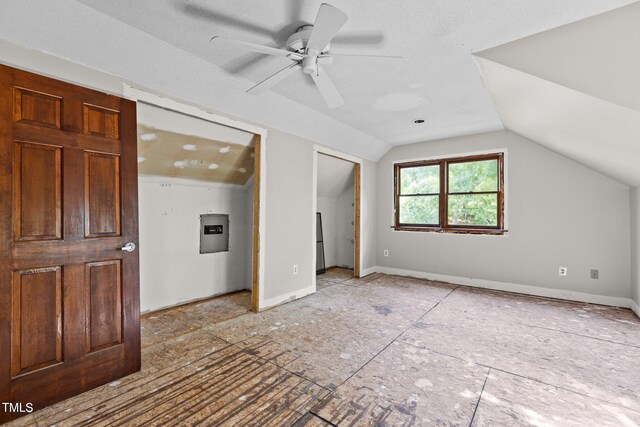 5900 Ebenezer Church Rd, Raleigh, NC 27612 - unfurnished bedroom with vaulted ceiling, a ceiling fan, and baseboards