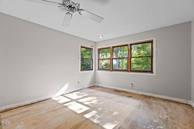 5900 Ebenezer Church Rd, Raleigh, NC 27612 - unfurnished room featuring baseboards and a ceiling fan