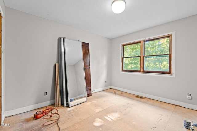 5900 Ebenezer Church Rd, Raleigh, NC 27612 - unfurnished bedroom with baseboards