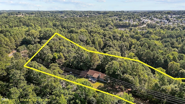 5900 Ebenezer Church Rd, Raleigh, NC 27612 - aerial overview of property's location with a forest and property boundaries highlighted