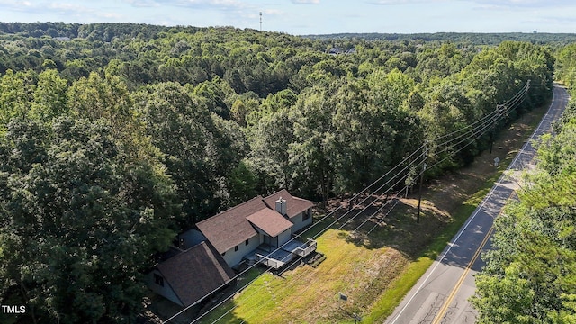 5900 Ebenezer Church Rd, Raleigh, NC 27612 - aerial view of property and surrounding area featuring a heavily wooded area