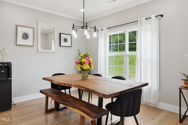 2004 Tennessee Rd, Durham, NC 27704 - dining space with baseboards, light wood-style floors, ornamental molding, and recessed lighting