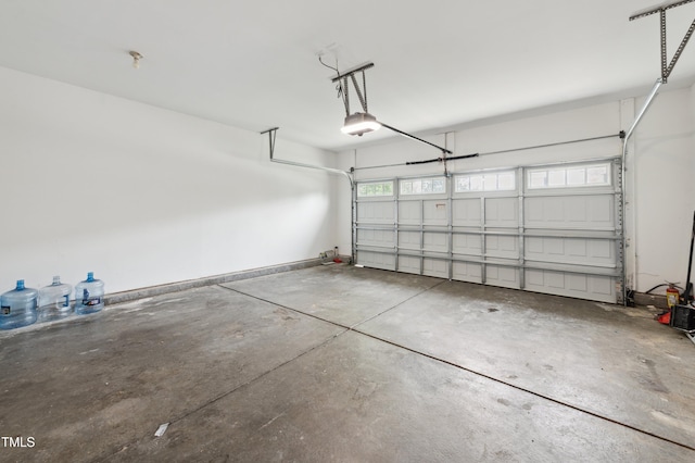 2004 Tennessee Rd, Durham, NC 27704 - garage featuring a garage door opener